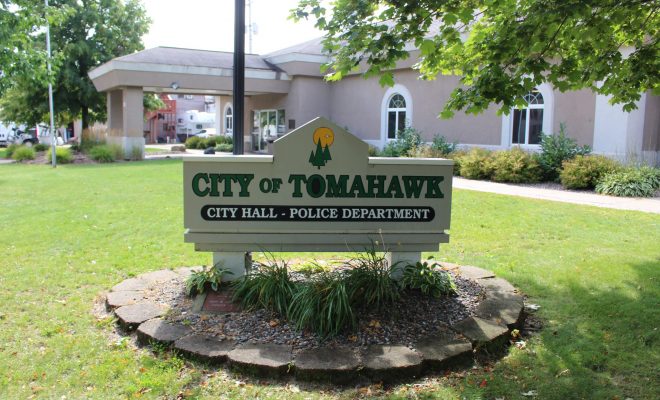 Tomahawk City Hall and Tomahawk Police Department Sign