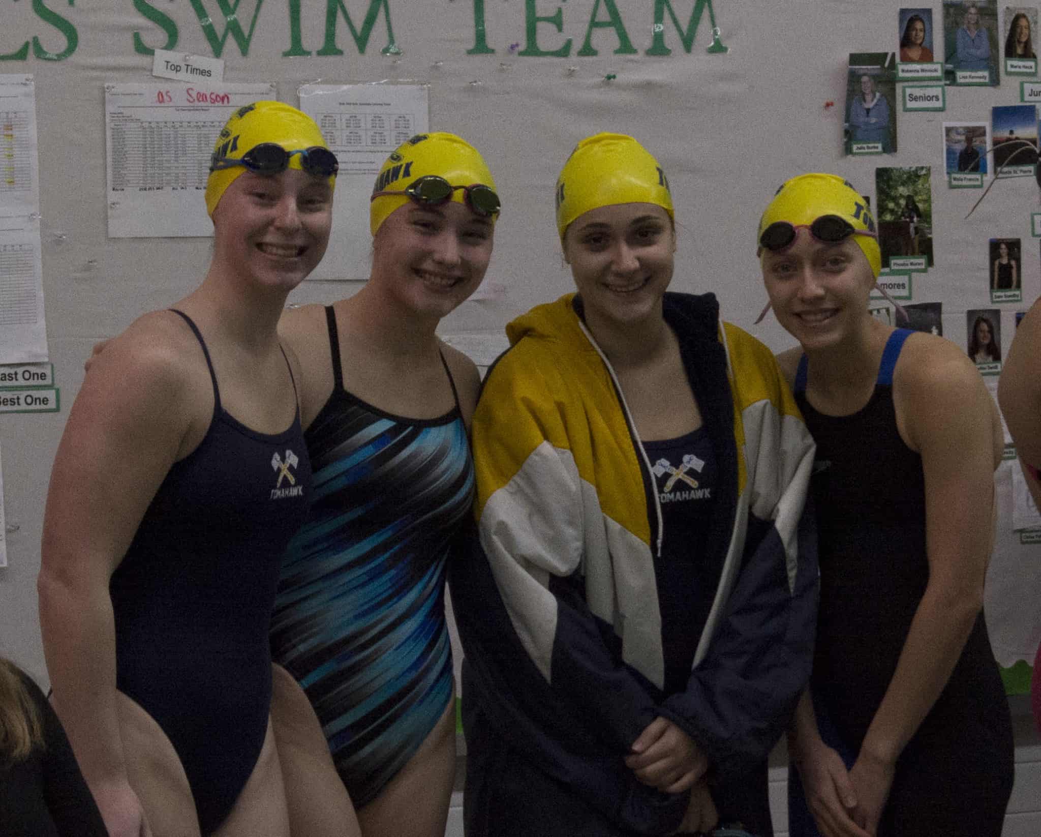 Multiple Hatchet swimmers set personal records in sectional races;  Karlie Woodall qualifies for State