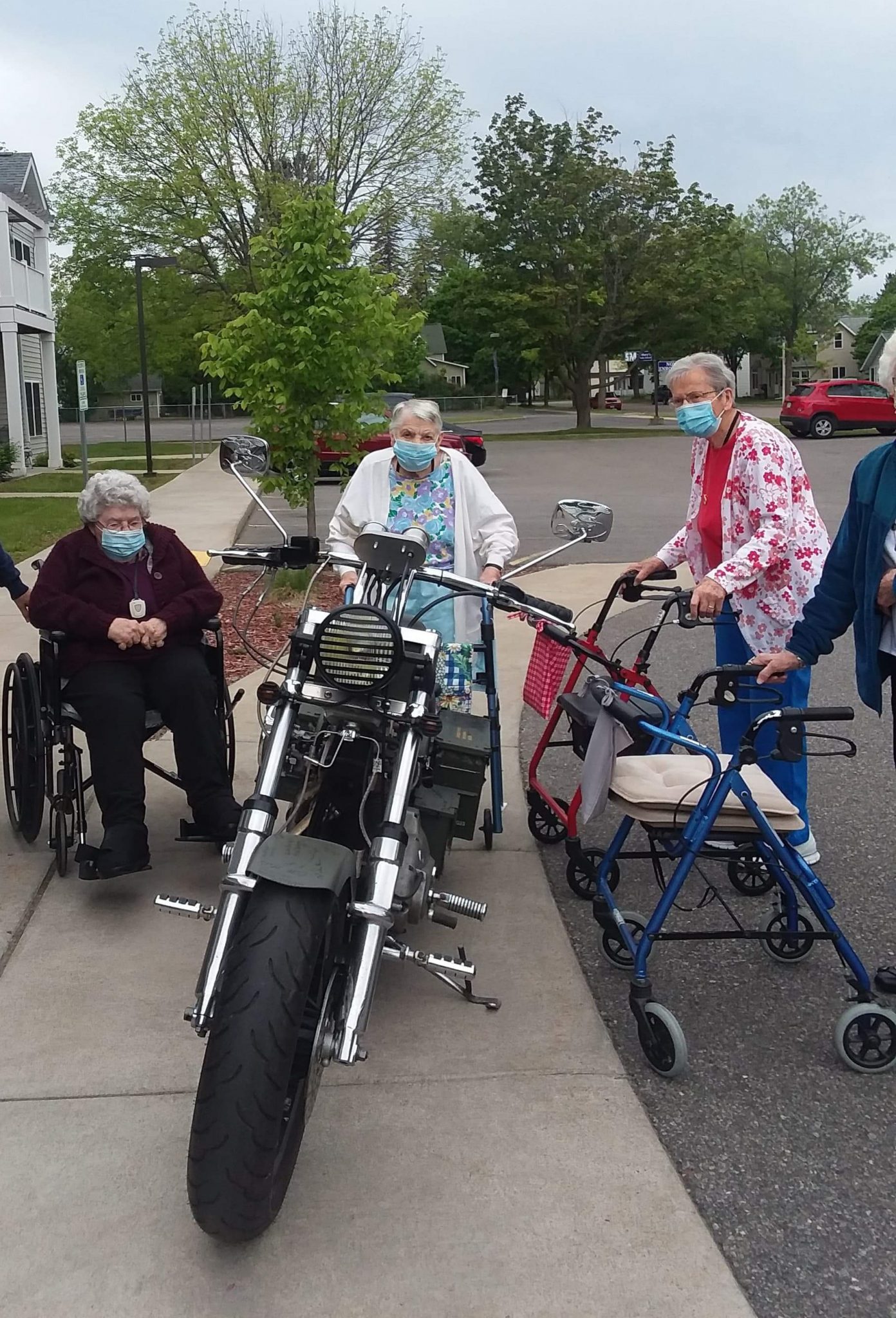 Car show participants visit Milestone Senior Living on motorcycles