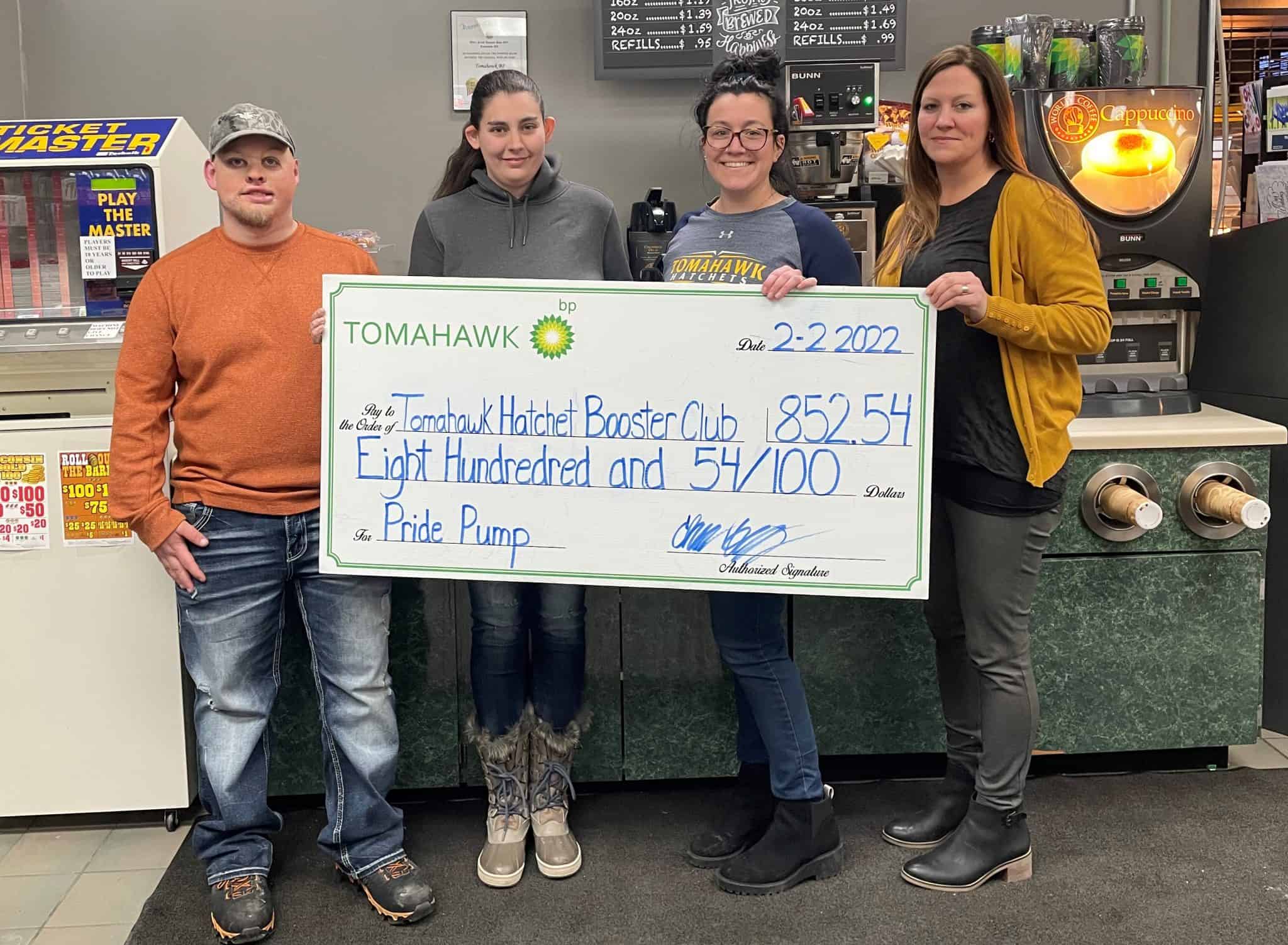 Tomahawk BP donates Pride Pump funds to Hatchet Booster Club