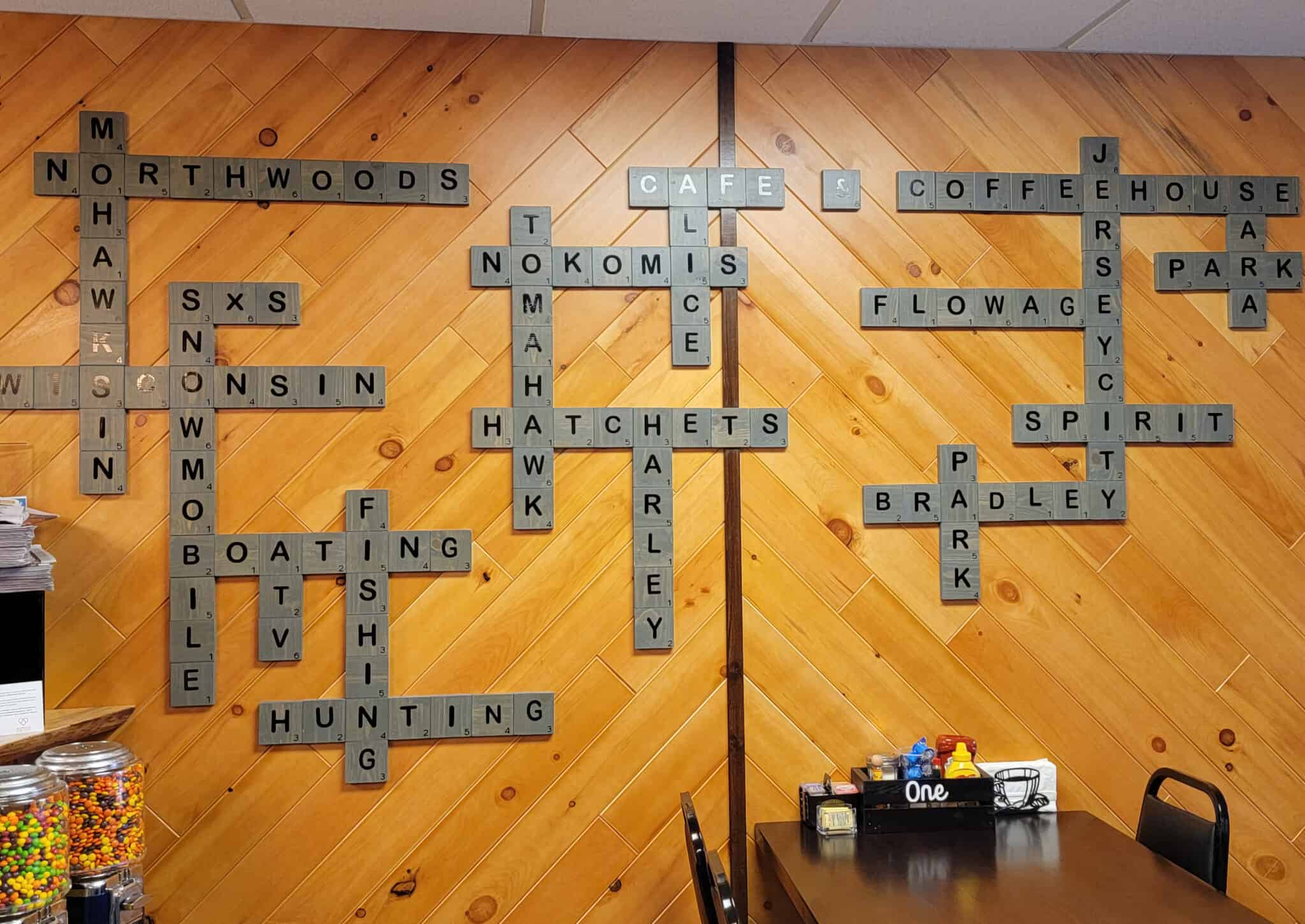 Crossword puzzle wall display at Northwoods Café and Coffeehouse highlights Tomahawk area