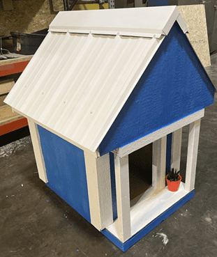 Tomahawk LP employees design, build, donate doghouse as part of company-wide competition
