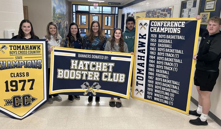 Hatchet Booster Club donates new banners for fieldhouse
